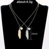 Vintage Feather Pendant Necklace with Sparkling Round Stone Accent Elegant Nature Inspired Jewelry for Women