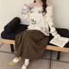 1011 autumn and winter new one-word shoulder flower knitted sweater women's top design sense niche and thin pure desire lazy sweater