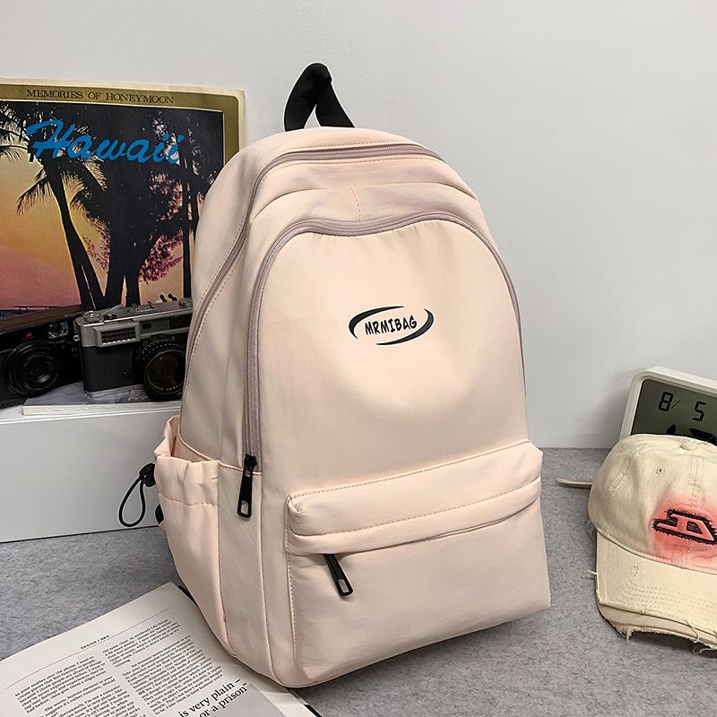 

Large capacity school bag male high school birthday department college student travel backpack light female junior high school student backpack trend розовый