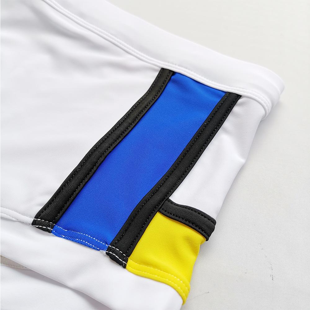 UXH Men's Patchwork Multicolor Briefs - Sleek, Sexy, and Anti-Exposure Beachwear.