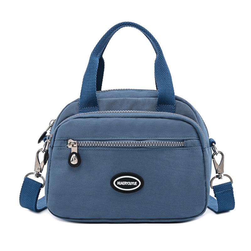 

2024 летняя новая женская сумка через границу, модная портативная сумка через плечо, легкая потертая нейлоновая повседневная сумка синий/серый