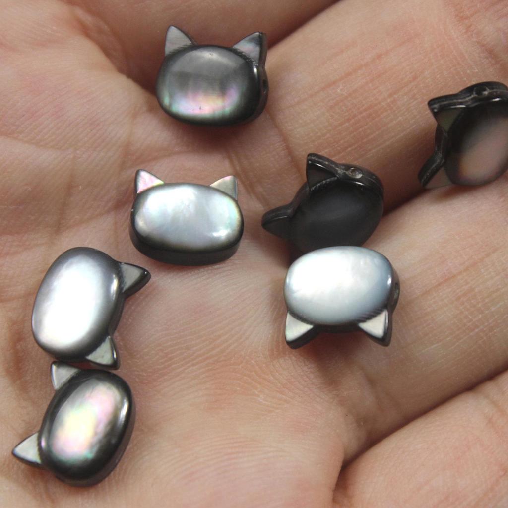 Perles d'espacement à perles Tête de chaton coquillage pour bijoux DIY: Accessoires Bracelet/Collier Coquillage Noir et Blanc.