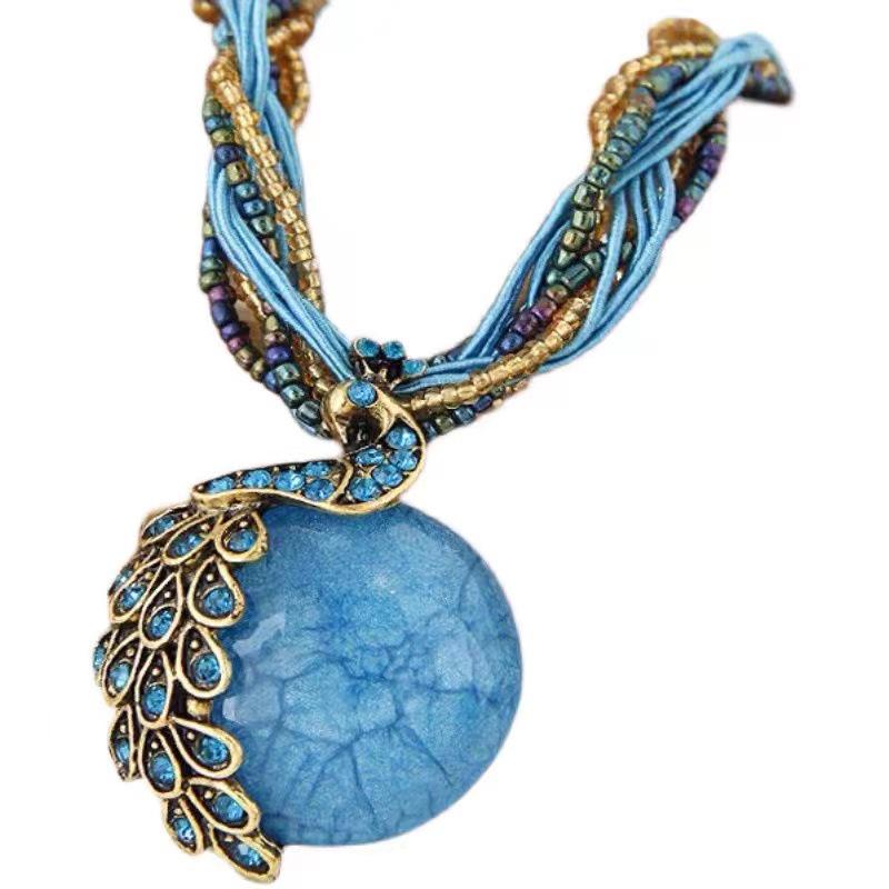 

Bohemian Tassel Peacock Gem Necklace