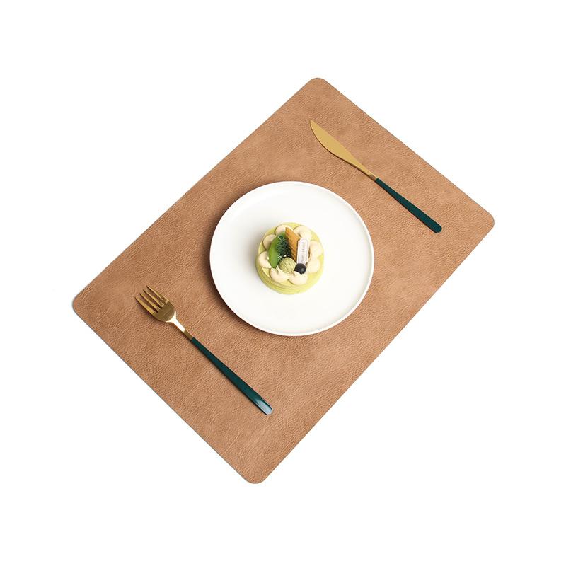 

Leather Dining Mat with Anti Scalding Double-sided Integrated Cowhide Pattern , Hotel and Household Thermal Insulation Mat 1PCS