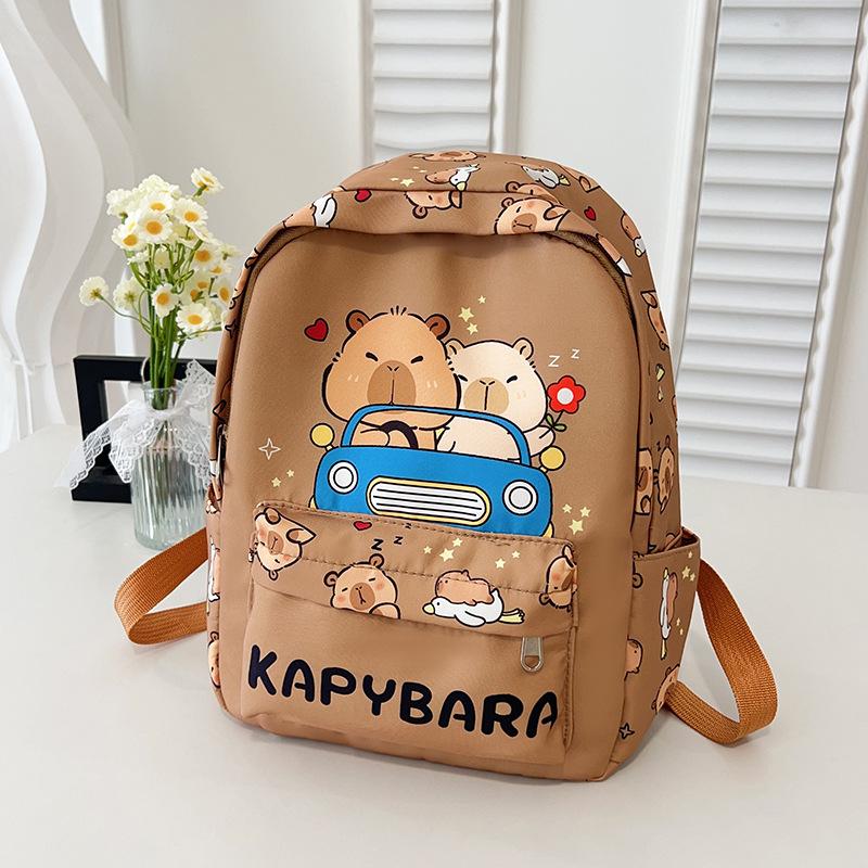 Fashion temperament Trend backpack Junior high school primary school schoolbag Large capacity decompression backpack Cartoon cute student bag