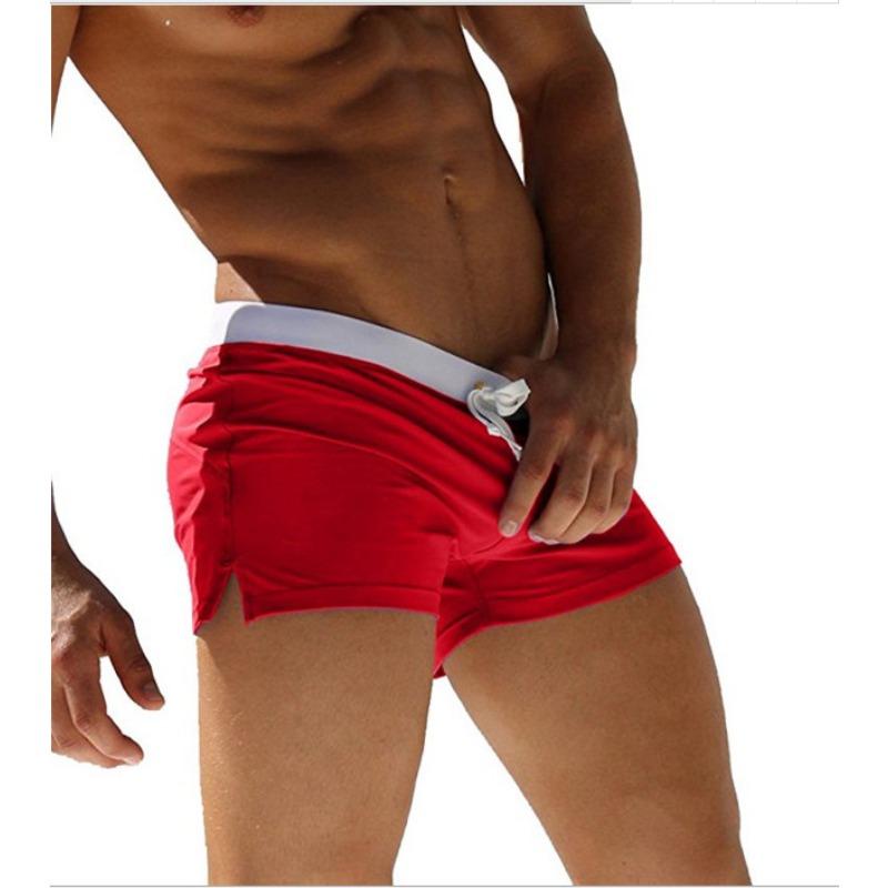 Men's solid color sexy and fashionable back pocket design, beach breathable quick-drying pants, boxer beach pants, swimming trunks.