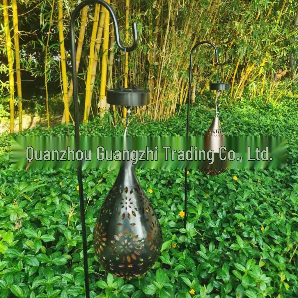 Cross-Border Iron Art Solar Lamp: Hollow Outdoor Courtyard Lawn Projection Light in Water Drop Shape