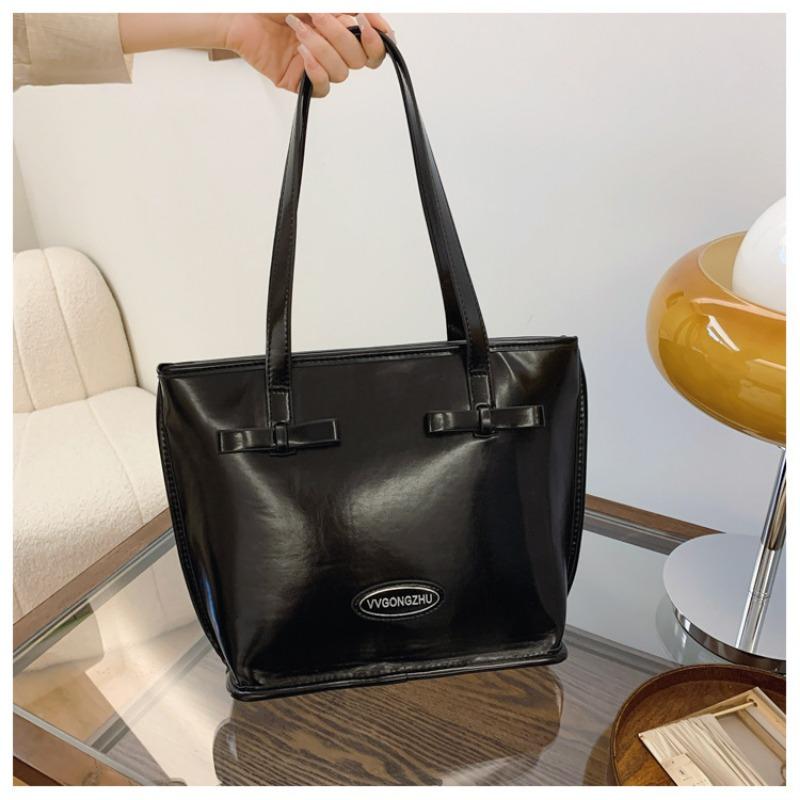 

Bag women s new bow versatile commuter handbag sweet girl contrasting underarm shoulder bag чорний