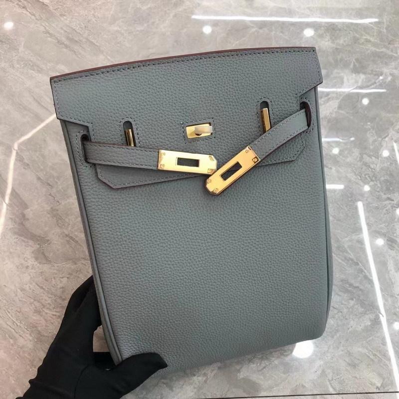 2026 Neues TOGO-Leder geschlechtsneutral gleicher Stil, Rindsleder erste Schicht rundes Schlossloch Brusttasche, einzelne Schulter Kelly-Leder Rucksack