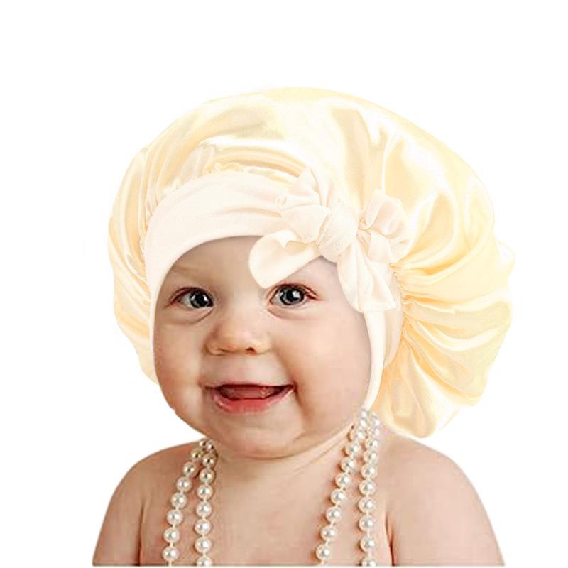 European and American popular wide-sided elastic streamer nightcap, children's bow solid color round hat home hat JDKB-21B