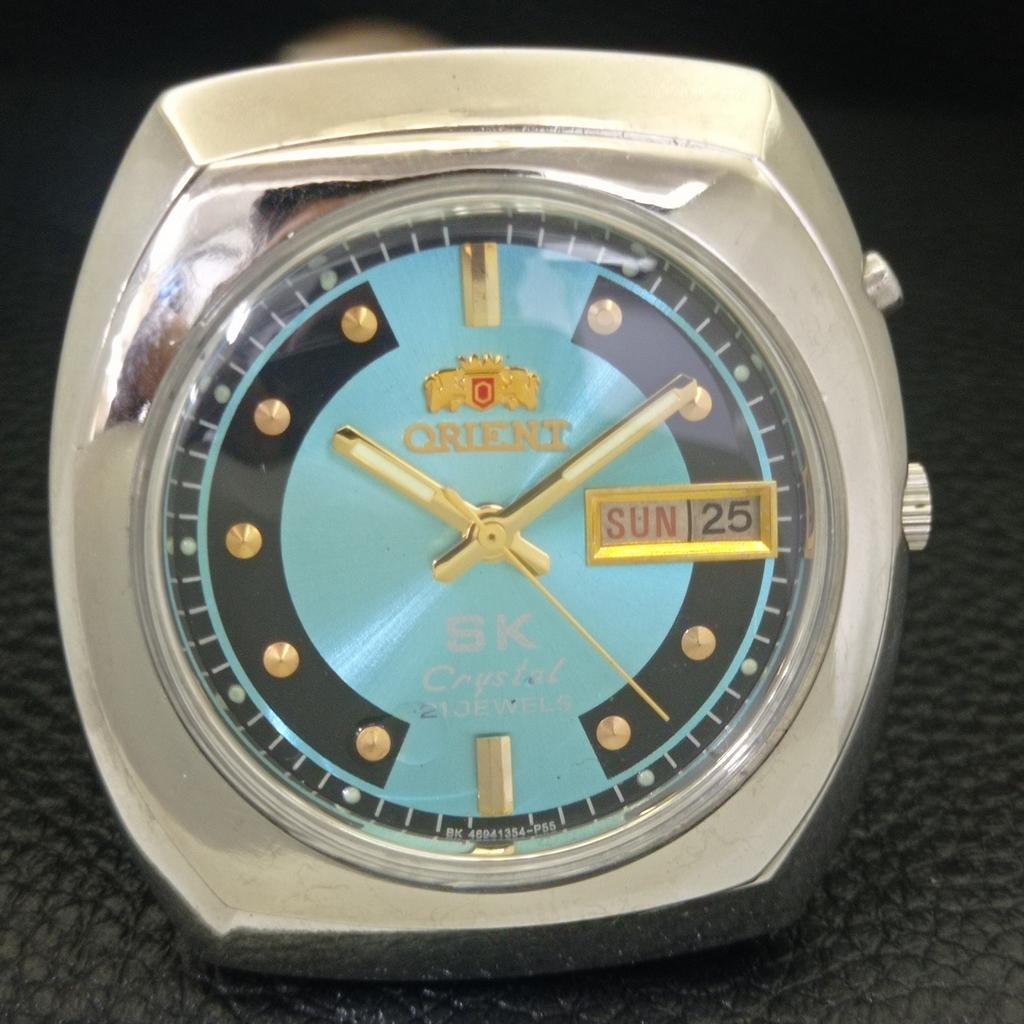 JAPAN VINTAGE ORIENT SK CRYSTAL AUTOMATIC MENS SKY BLUE DIAL WATCH a703412-1