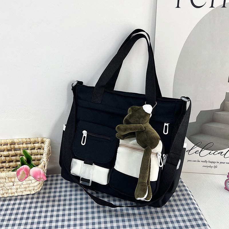 Large capacity bag female messenger ins wind Japanese college students class shoulder bag versatile literary tote bag