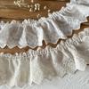 Lace Trim Cotton Skirt with Embroidered Patches, Ruffled Hem, and Bow Accent