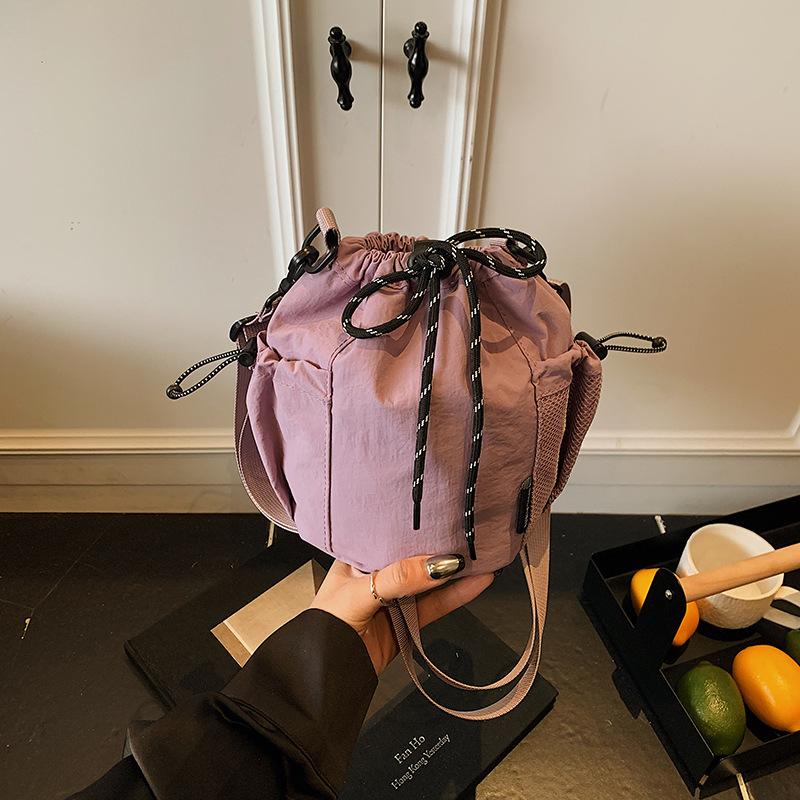Niche fashion crossbody drawstring bucket bag new casual simple versatile commuter shoulder bag