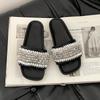 Fashion versatile casual exquisite rhinestone thick-soled one-word slippers women's summer retro temperament open-toed flat-bottomed cool slippers