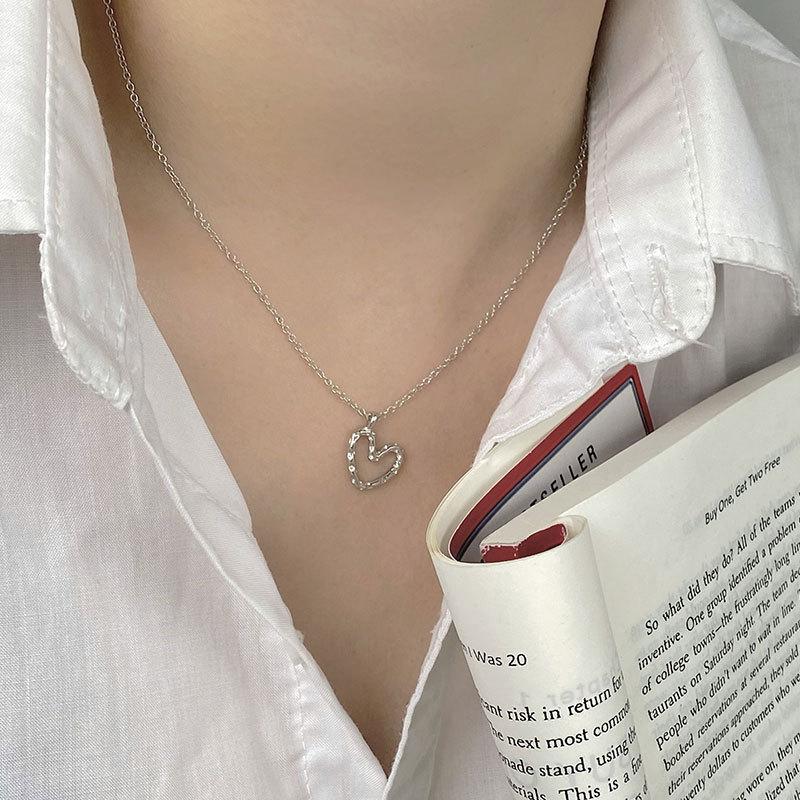 Wrinkled Lava Heart-shaped Necklace with Hollowed Out Heart-shaped Pendant, Collarbone Chain, Niche Design, Temperament