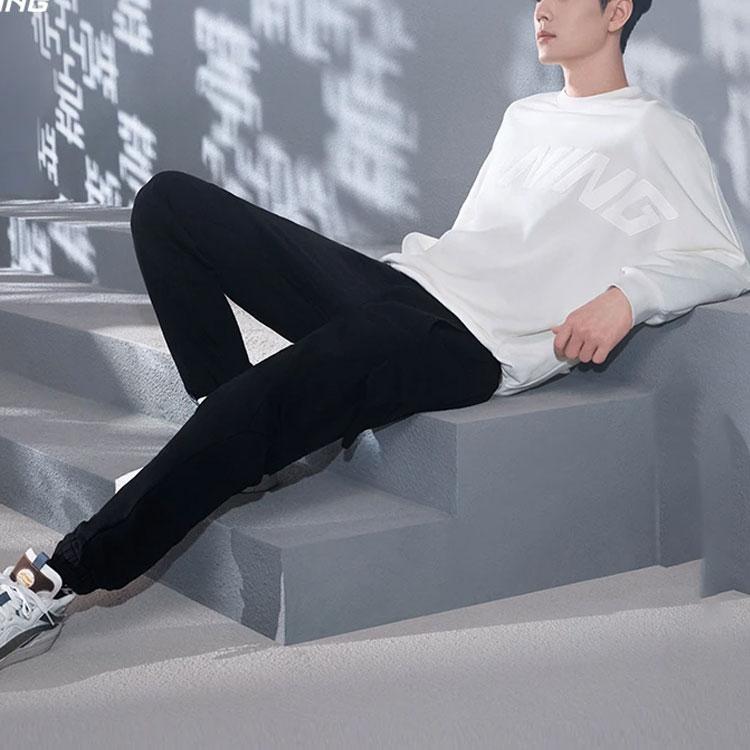 Li Ning Sports Trend Series Logo Print Loose Fit Cuffed Knit Sweatpants Men Bottoms Black AKLS927-1