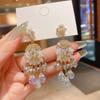 Exotic high-end fringed earrings, niche retro ethnic style earrings, French heavy industry bohemian earrings.
