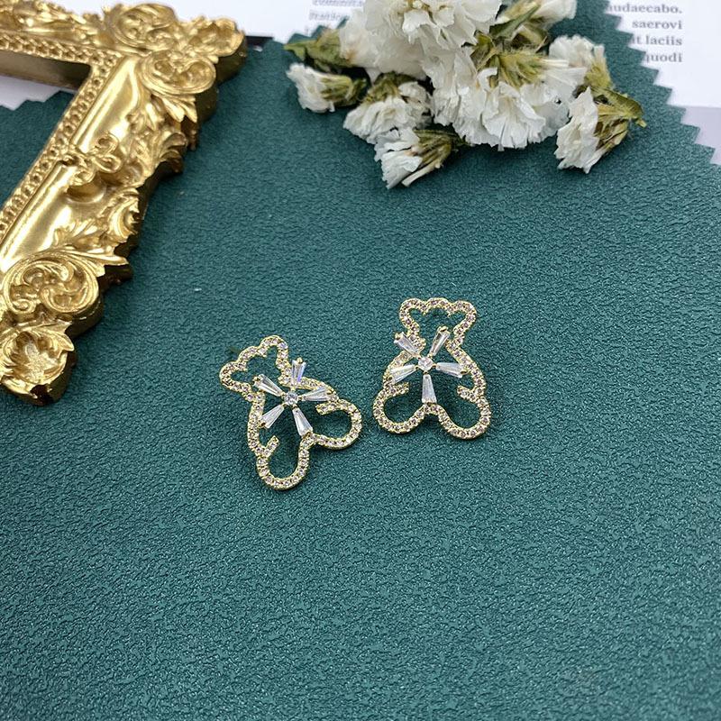 Trendy brand design hollowed out cute little bear zircon flower temperament simple, compact and versatile earrings for women