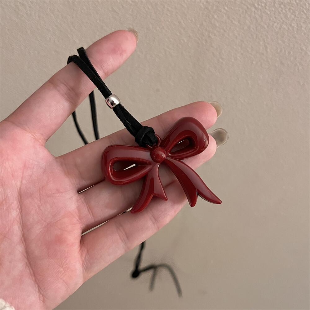 Autumn and Winter Wine Red Ribbon Bow Pendant Necklace Female Love Ankola Red Long Sweater Chain Versatile Accessories