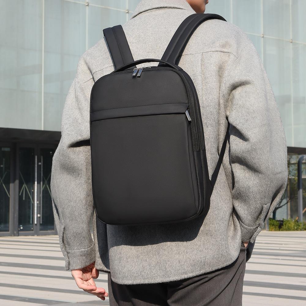 Sleek Minimalist Backpack with Front Zipper Pocket and Padded Shoulder Straps