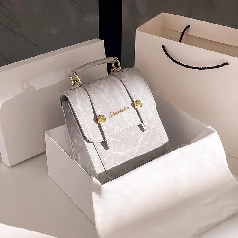 

2025 new niche versatile light college style simple commuting shopping small backpack women s backpack серебряный