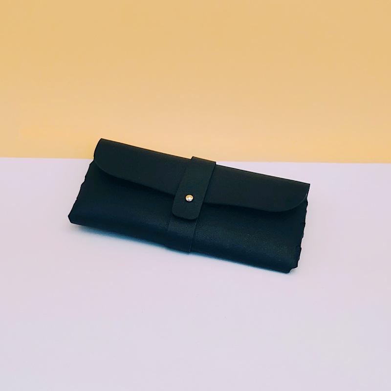 Minimalistisches Retro-Leder-Brillenetui - Tragbarer und schützender Sonnenbrillenbeutel.