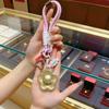 Zhou Family 999 Pure Gold Keychain Pendant - Elegant Gift for Girlfriend