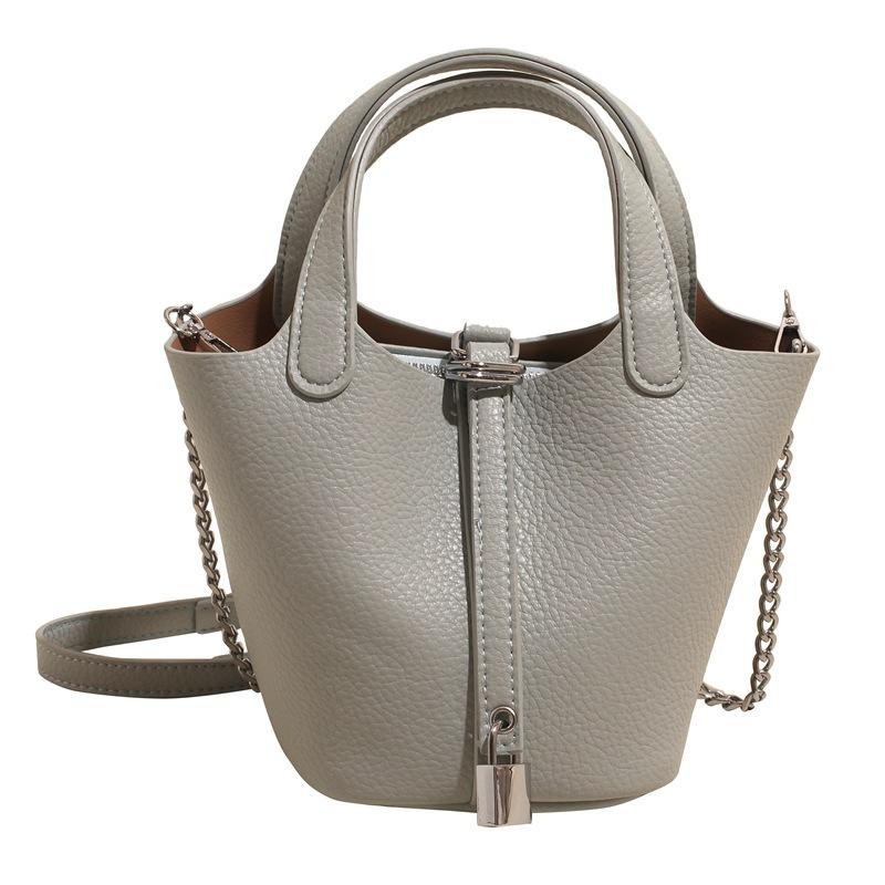 

New pink milkshake cabbage basket bag, free silk scarf bag, women s premium texture bucket bag, portable women s bag. Without pendant синий