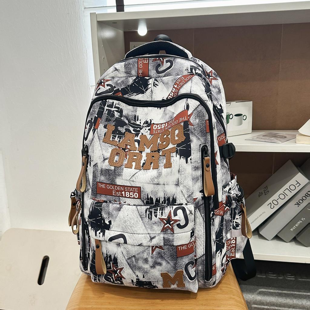 New Graffiti Niche School Bag for Junior High and High School Boys, Lightweight Spine Protection, Lightweight Large Capacity Design Laptop Backpack
