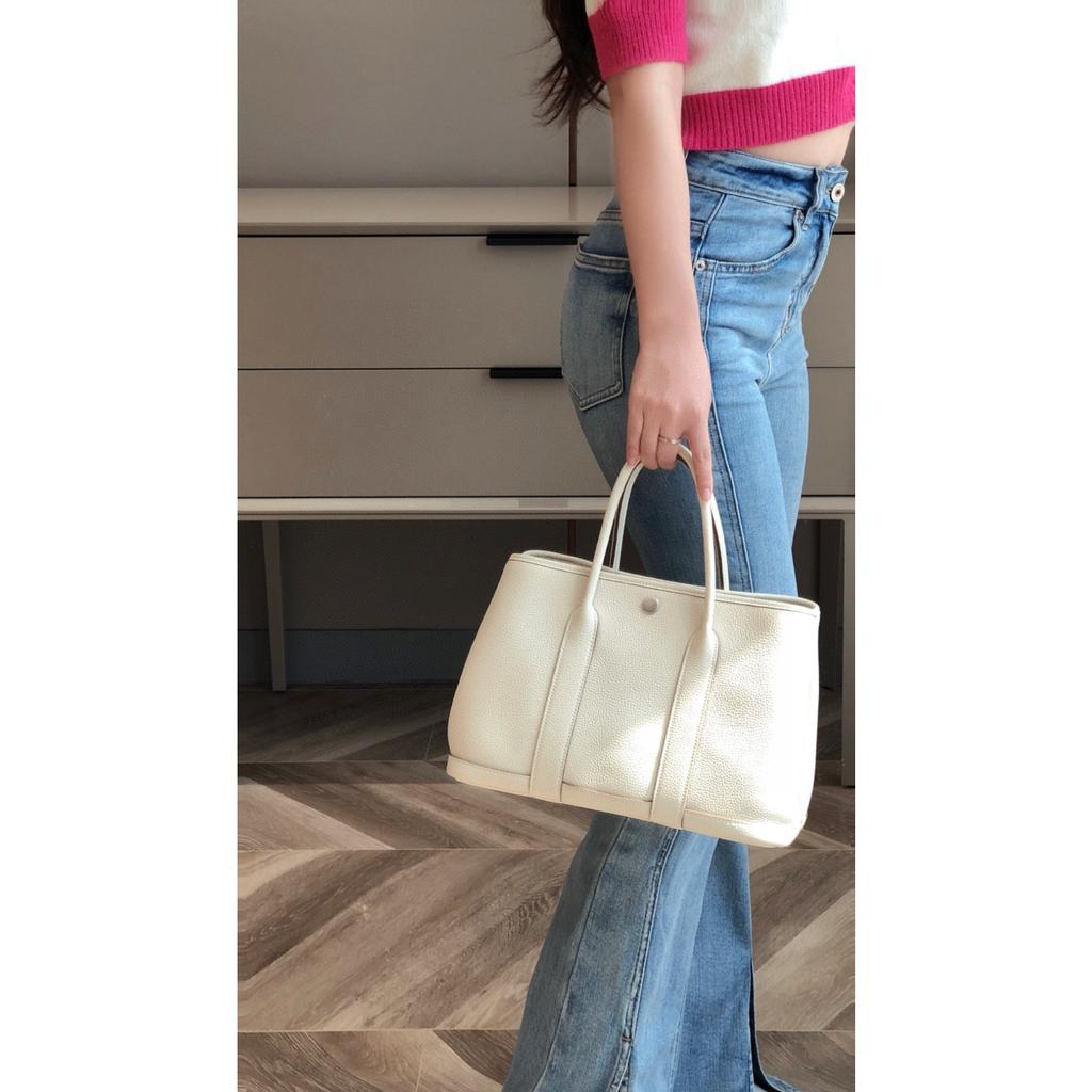 Borsa da giardino cucita a mano con filo cerato, ferramenta interamente in acciaio, borsa da donna portatile in pelle bovina primo strato con motivo a collo di mucca Ntogo