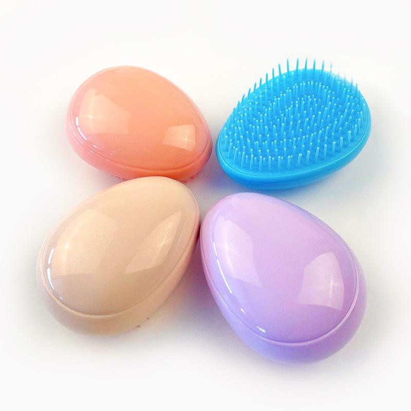 Portable Egg-Shaped Hair Smoothing Comb - Versatile for Wet & Dry Use, Cushion Design, Ideal for Kids