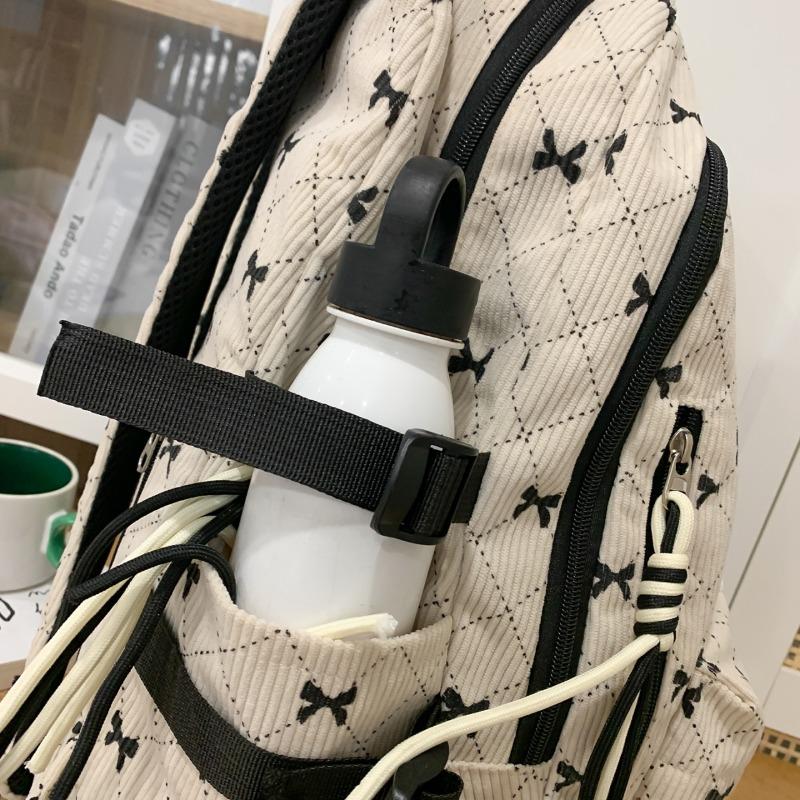 Bow Print Corduroy Backpack Casual Fashion Daily Bag Large Capacity School Bag for Students Minimalist Design Commute Travel with Tassel Accents