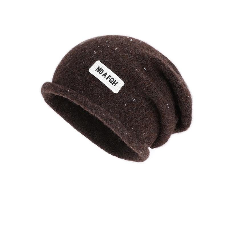 Curled head hat women's autumn and winter outdoor warm ear protection knitted wool hat showing face small versatile pile hat
