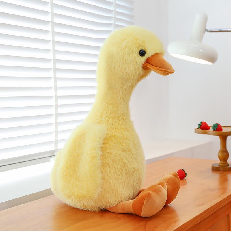 

Милая маленькая большая желтая плюшевая игрушка утка - черная подушка для сна утка для детей 45cm 0.2kg