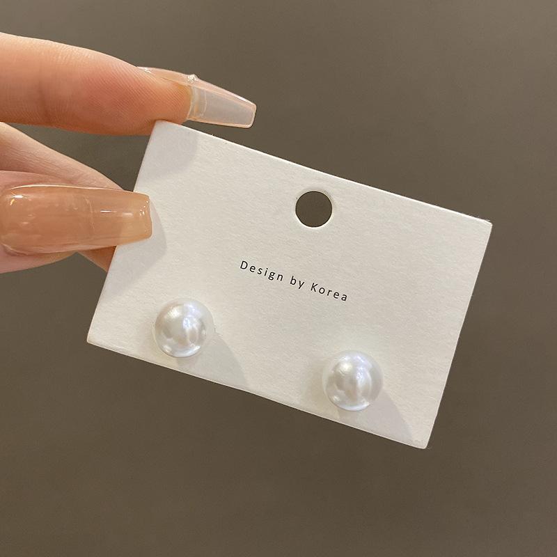 925 silver needle pearl earrings women s high-end sense niche temperament bow stud earrings retro ear jewelry wholesale