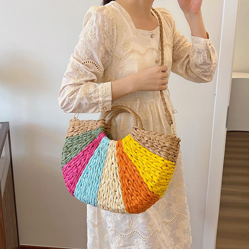 Summer new contrasting color rainbow straw bag portable shoulder oblique span women's bag