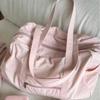 Pink casual large-capacity bag for women, new fashionable commuting simple niche design travel fitness bag