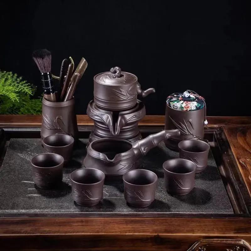 Purple Clay Stone Grinding Semi-automatic Tea Set Creative Kung Fu Tea Hot Sales of Tea Set.Creative