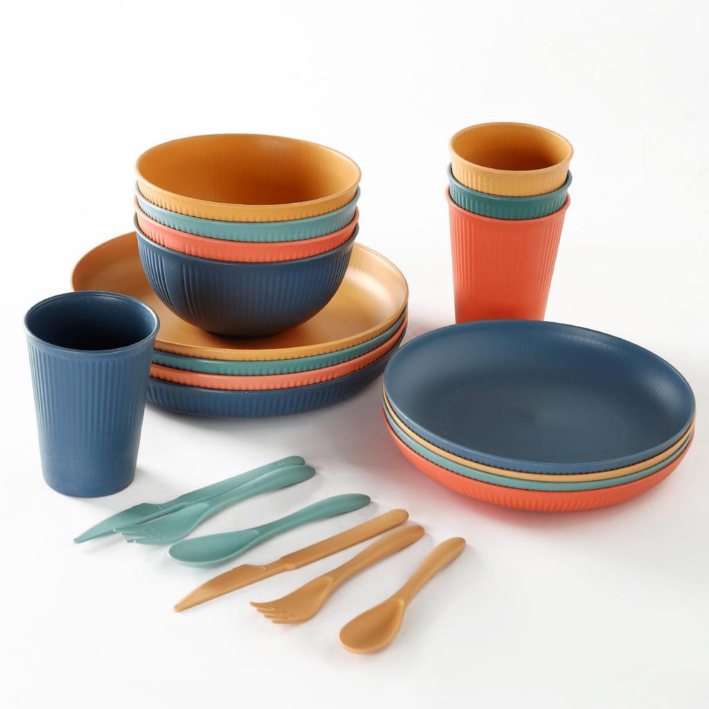16-Piece Wheat Straw Dinnerware Set: Includes Plates, Rice Bowls, Cups, Spoons, and Forks.