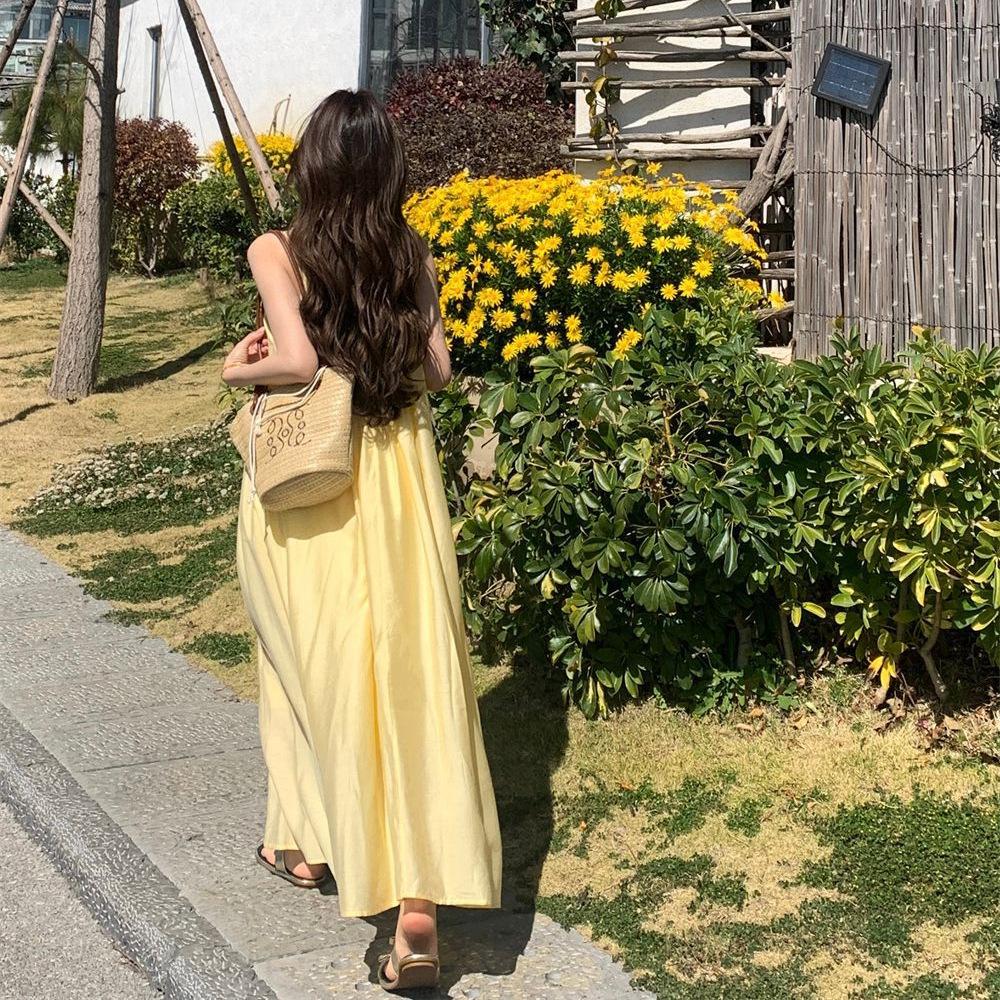 Holiday style yellow suspender dress women's clothing summer seaside wear skirt loose age-reducing A-shaped skirt long skirt