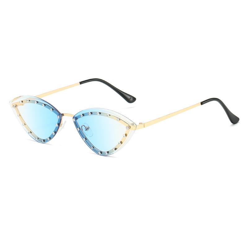 New metal cat s eye sunglasses, European and American small frame trimmed sunglasses, women s trendy street glasses