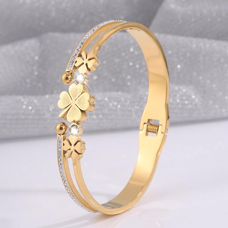 Zlatý náramek z nerezové oceli čtyřlístek pro ženy, módní a vynikající náramek pro štěstí se sponou na jaře