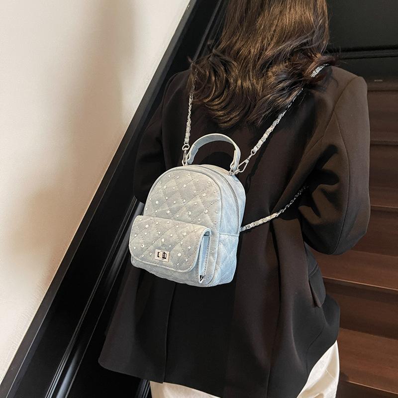Exquisites Xiaoxiangfeng Persönlichkeits-Diamantbesetzter Kleiner Damen-Pendlerrucksack Neue Mode Kettenglied Damen Tasche