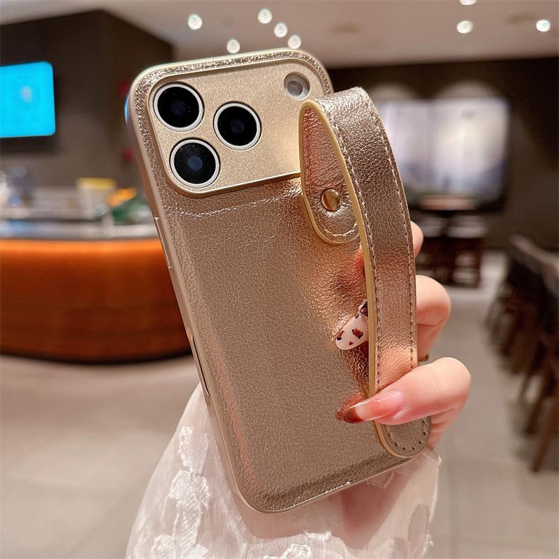 Leather Texture Wristband Holder Phone Case for iPhone 17 Air 16E 15 14 Plus 13 12 11 Pro Max Plain Color Matte Shockproof Cover