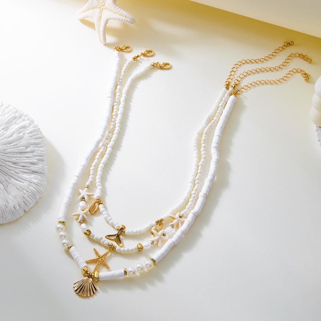 Boho Mehrschichtige Seestern Muschel Reiskorn Perlen Halskette für Damen Vintage Imitation Perlenstein Halskette Sommer Strandparty Schmuck