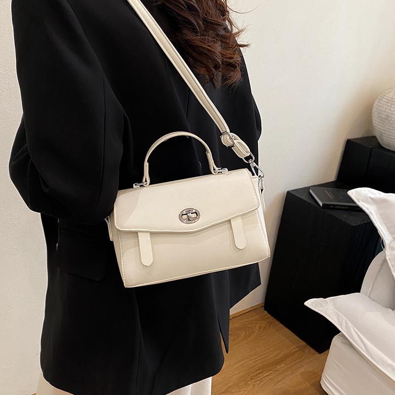 Summer new fashionable solid color lock flip bag versatile portable shoulder oblique span women's bag