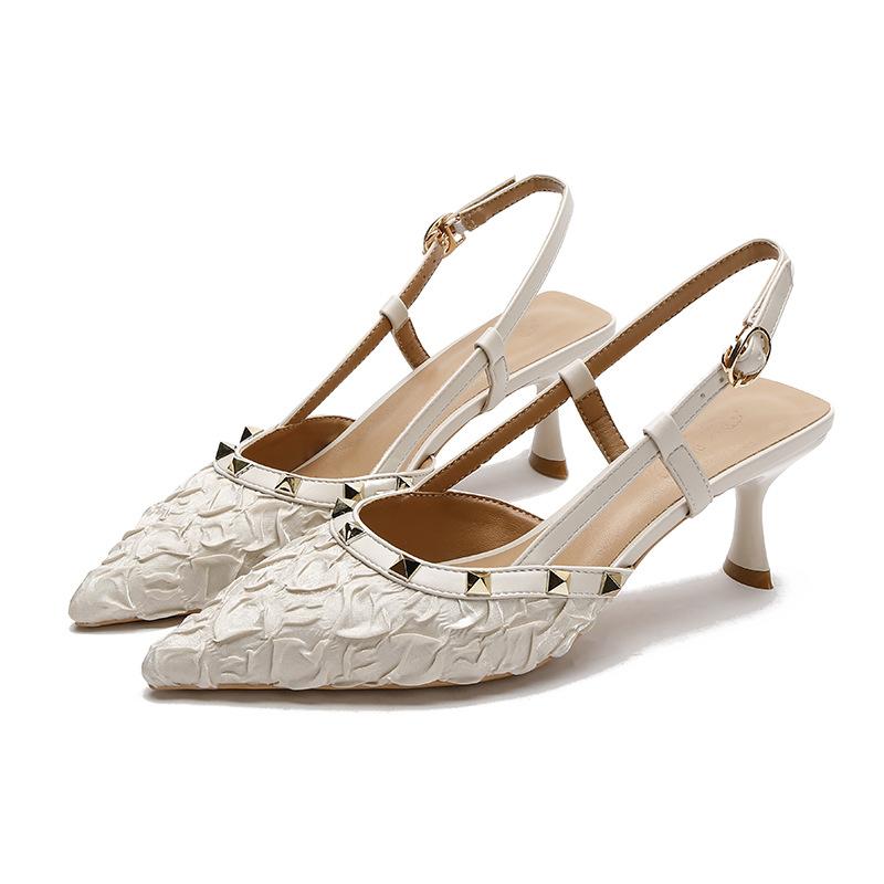 Baotou sandals women's 2025 new rivets one-word buckle belt fairy wind back empty single shoes pointed high heels stiletto