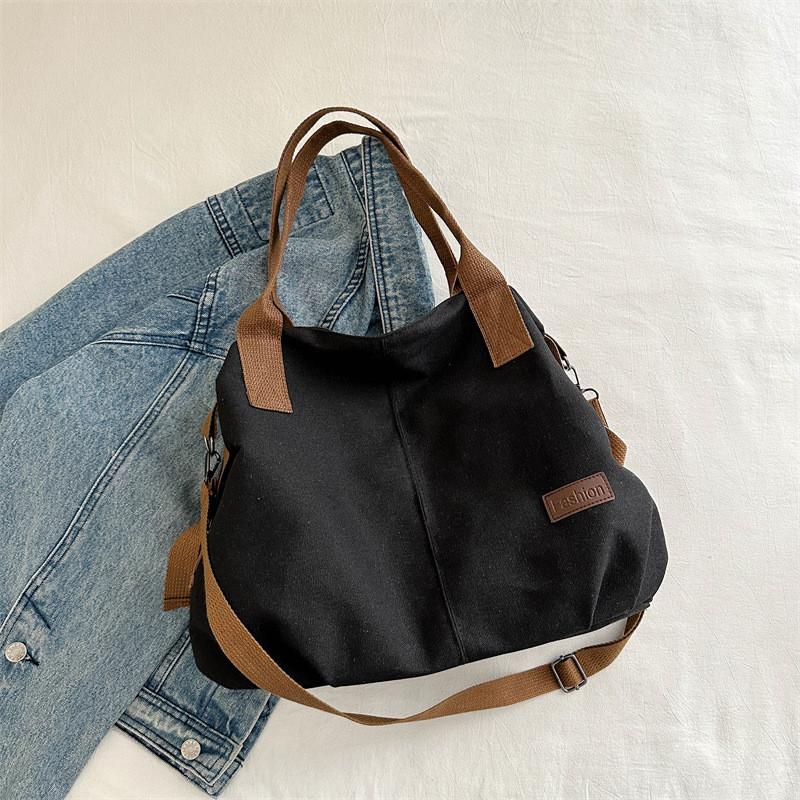 

Stylish Black And White Canvas Tote Bag For Women With Spacious Design And Trendy Aesthetic чёрный