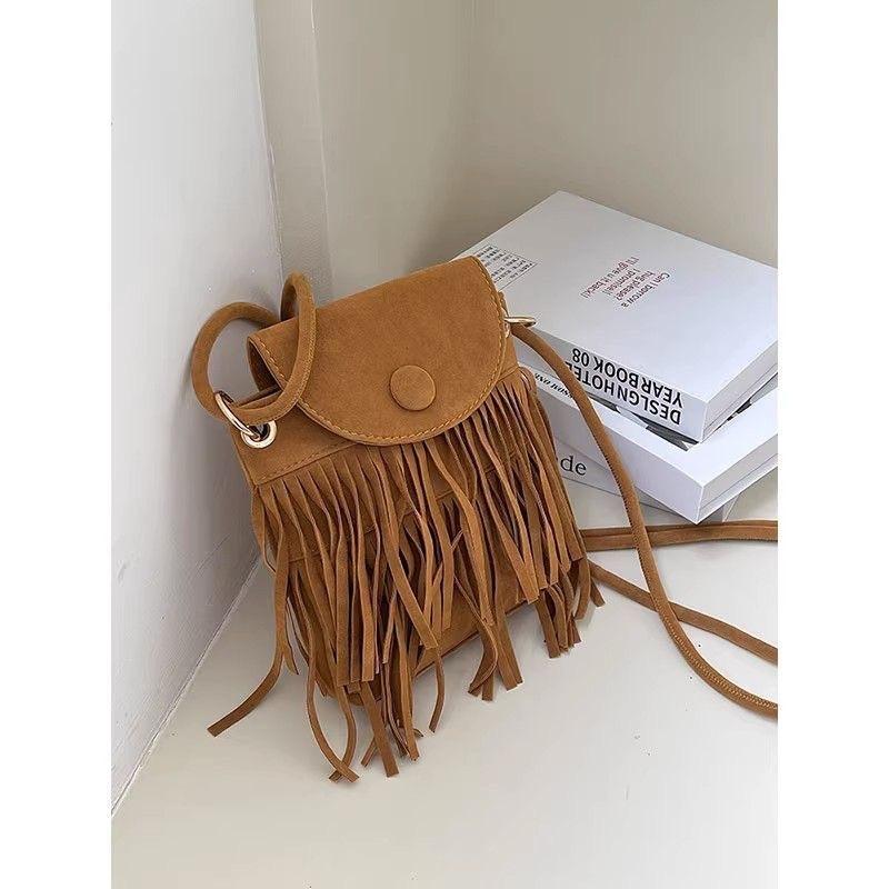 

New niche retro imitation suede fringed mobile phone bag women s shoulder messenger woven bag retro bag